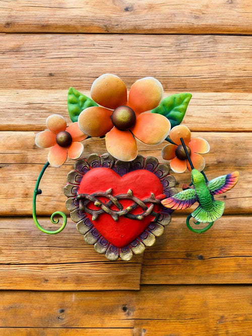 Metal heart wall decor with hummingbird and vines, handmade Mexican garden art