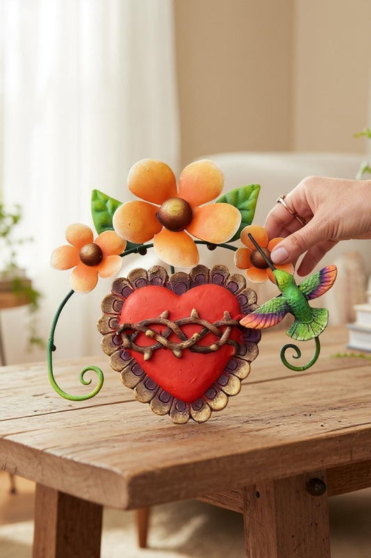 Heart and hummingbird metal wall decor with orange flowers, handmade Mexican folk art