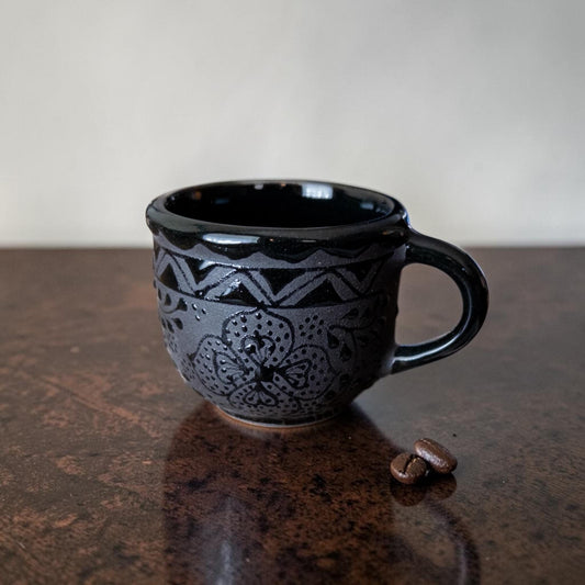 Handmade black espresso cup top view