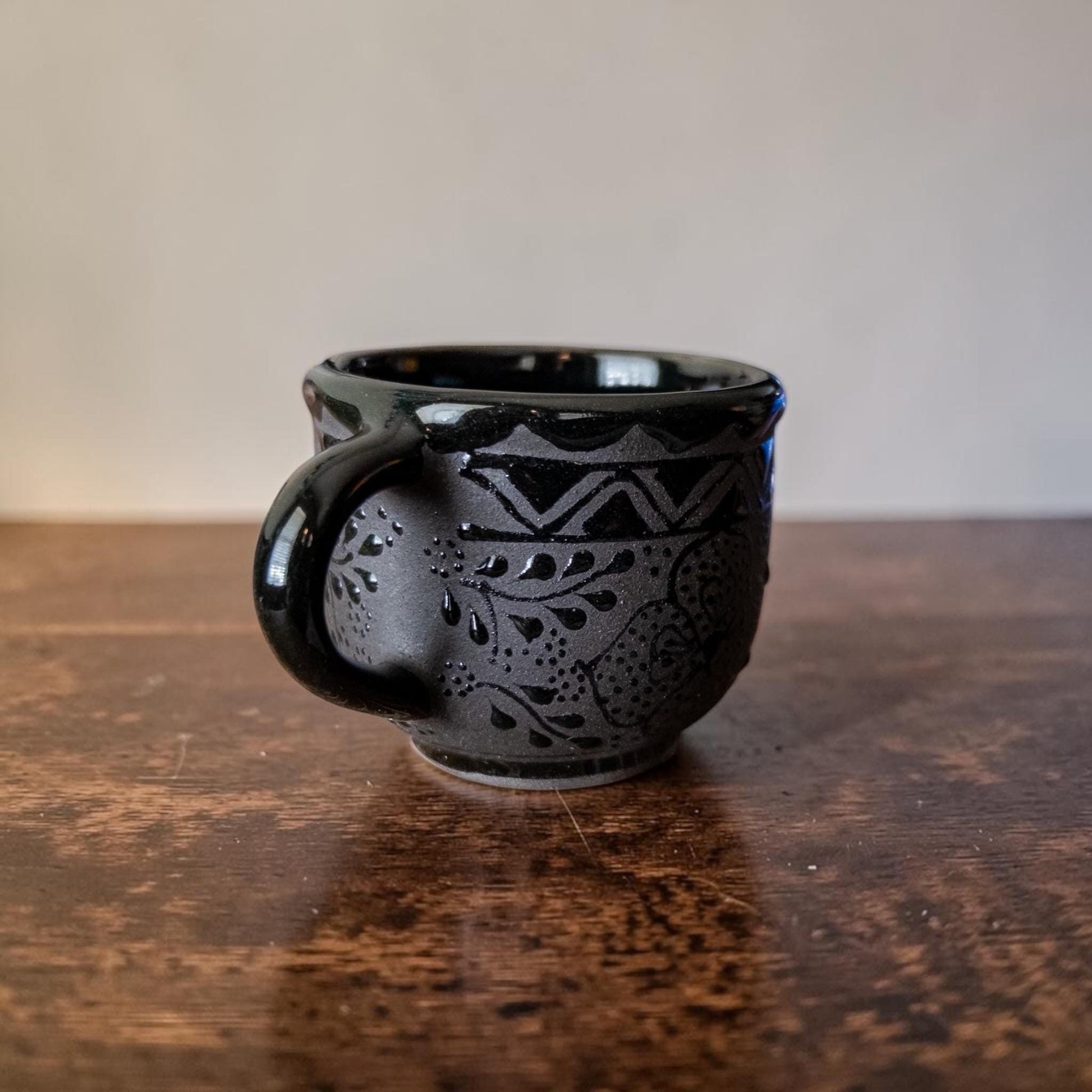 Stoneware espresso cup on coffee bar
