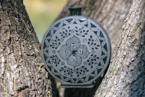Black stoneware decanter set side view