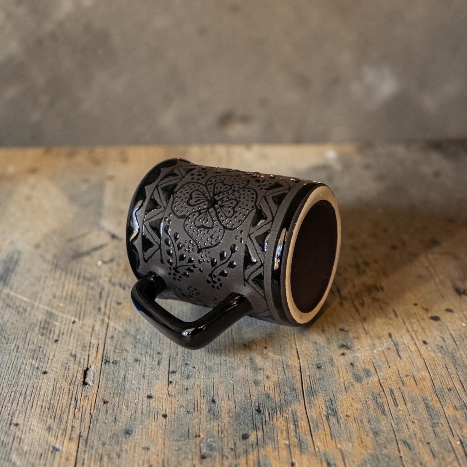 Handmade black coffee mug top view