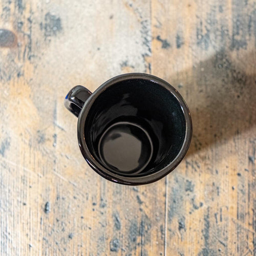 Black Mexican stoneware coffee mug side view