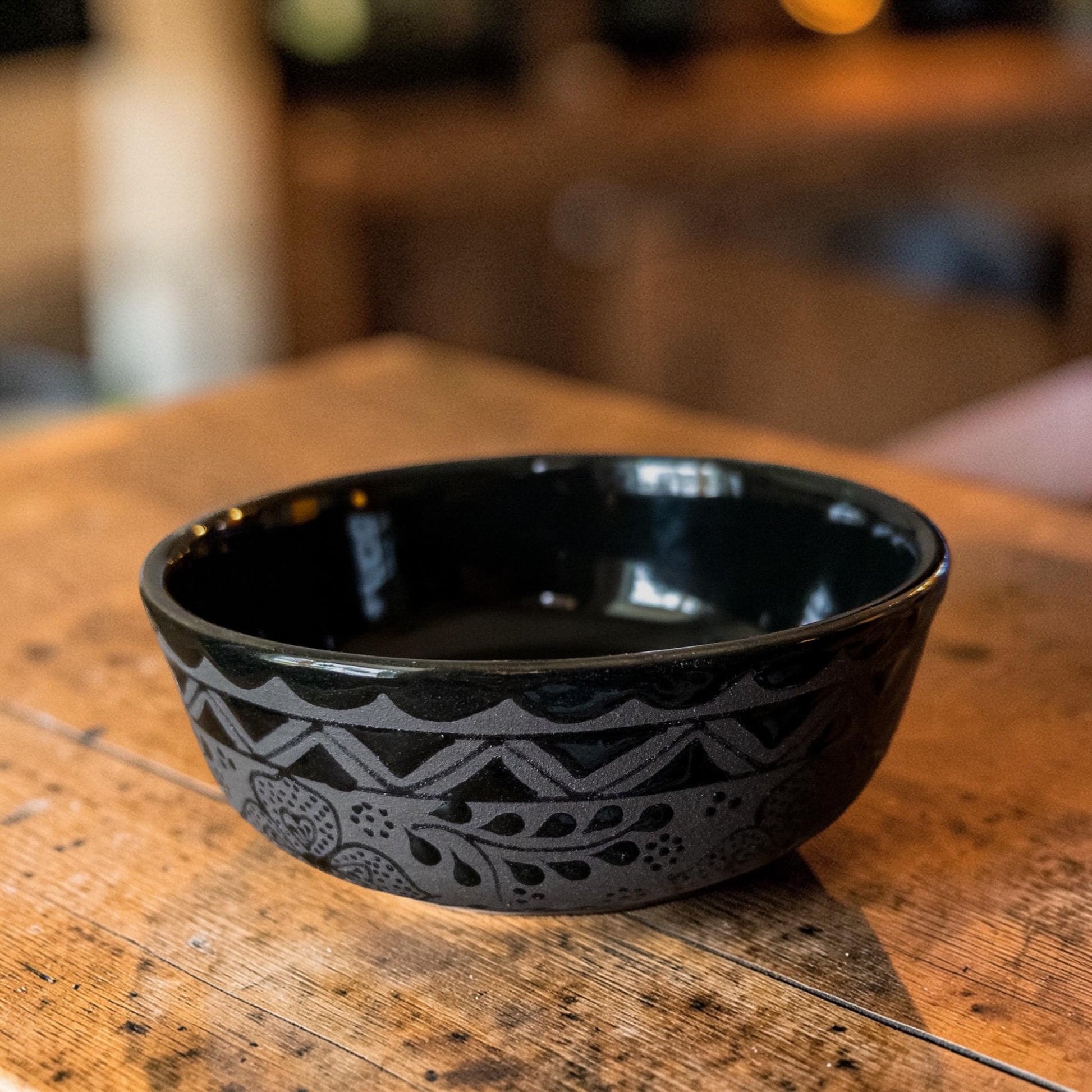 Black stoneware serving bowl hand-painted detail, Mexican pottery