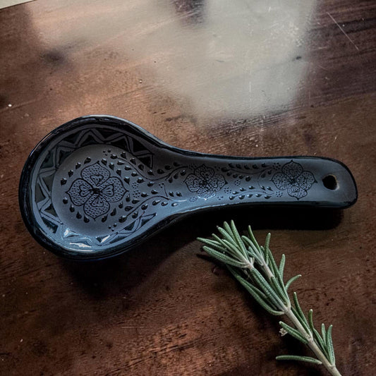 Handmade black ceramic spoon rest for kitchen countertop