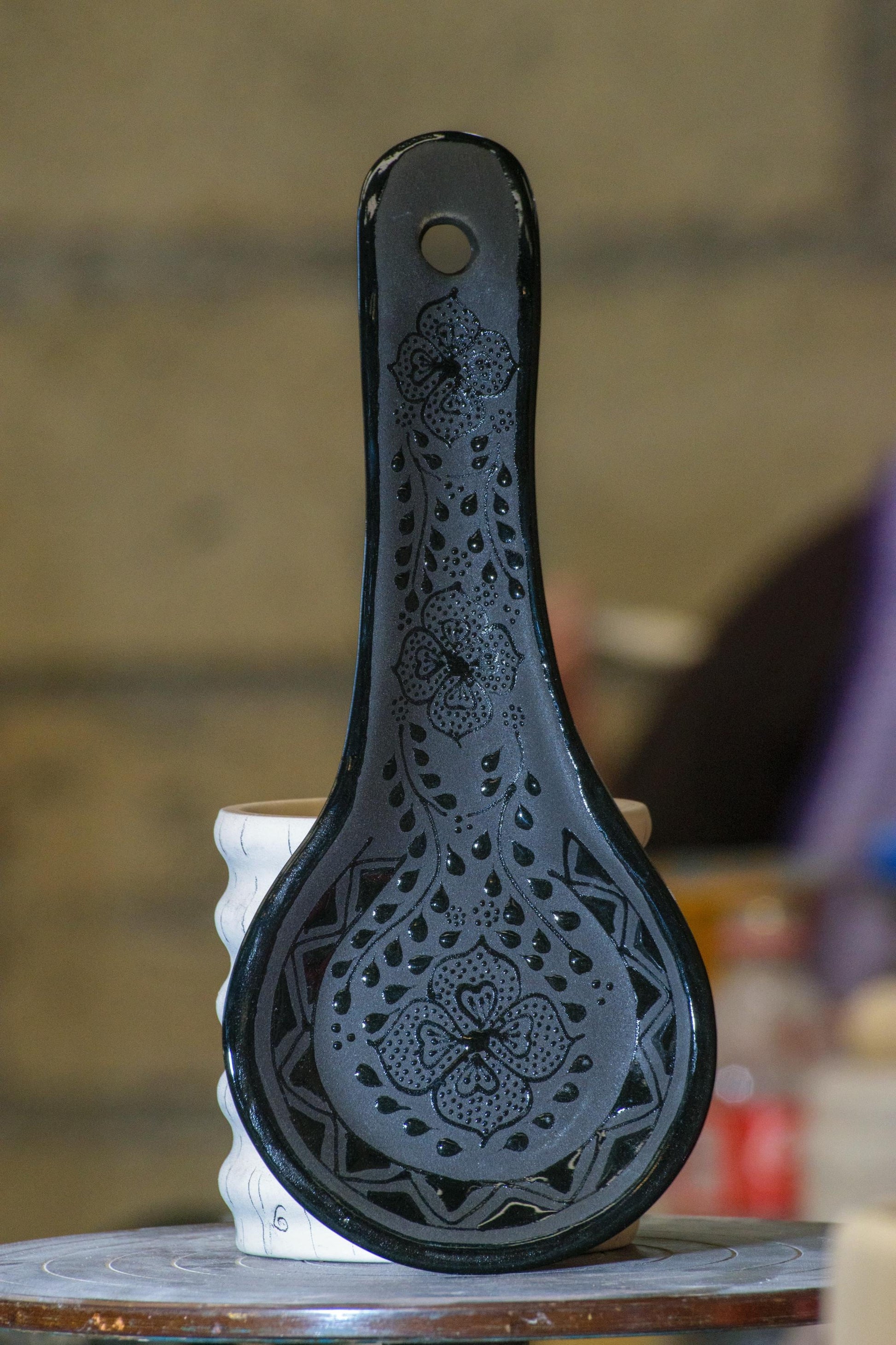 Black ceramic spoon rest top view - handmade stoneware