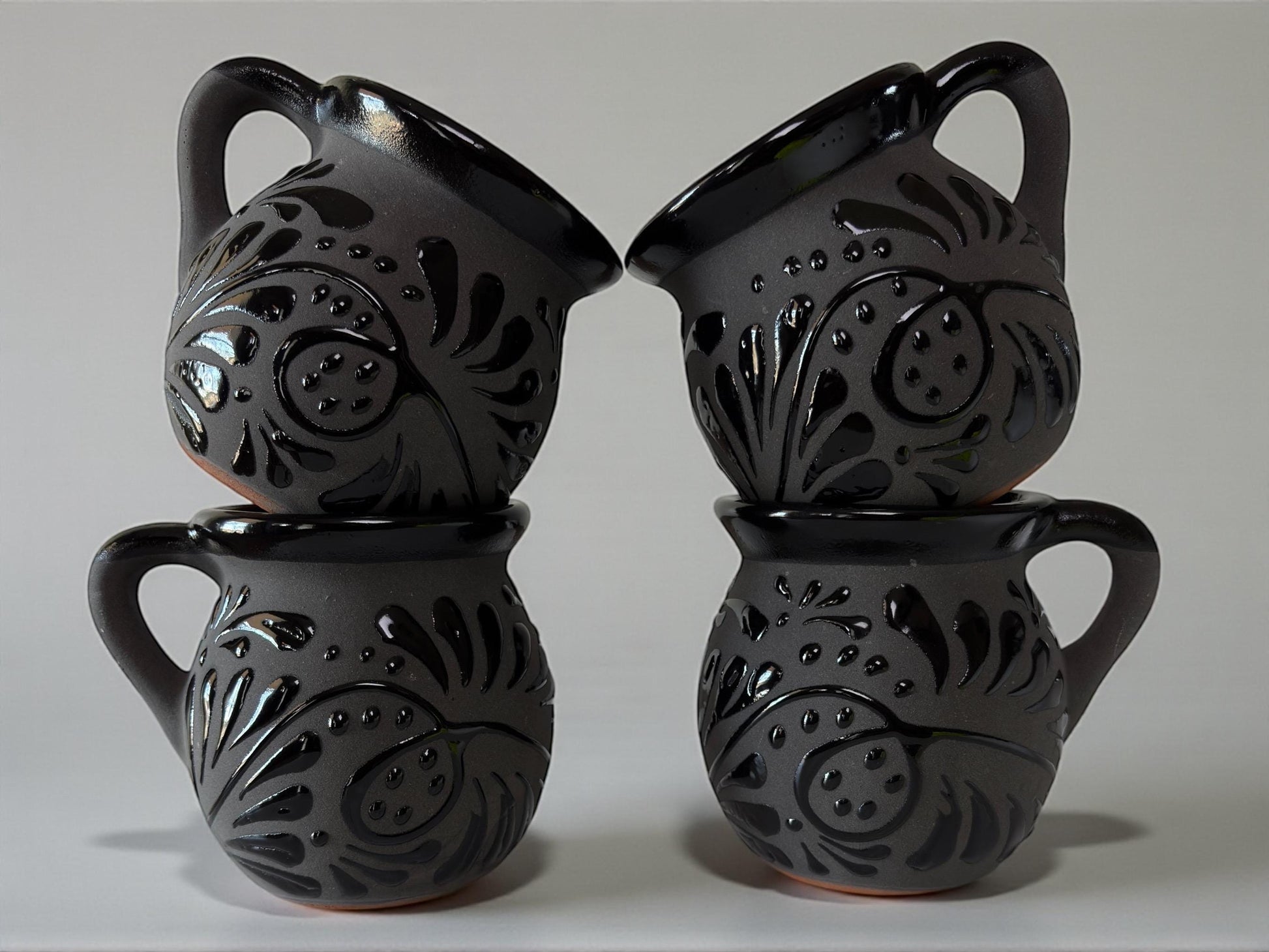 Black on black Talavera jarrito pattern detail