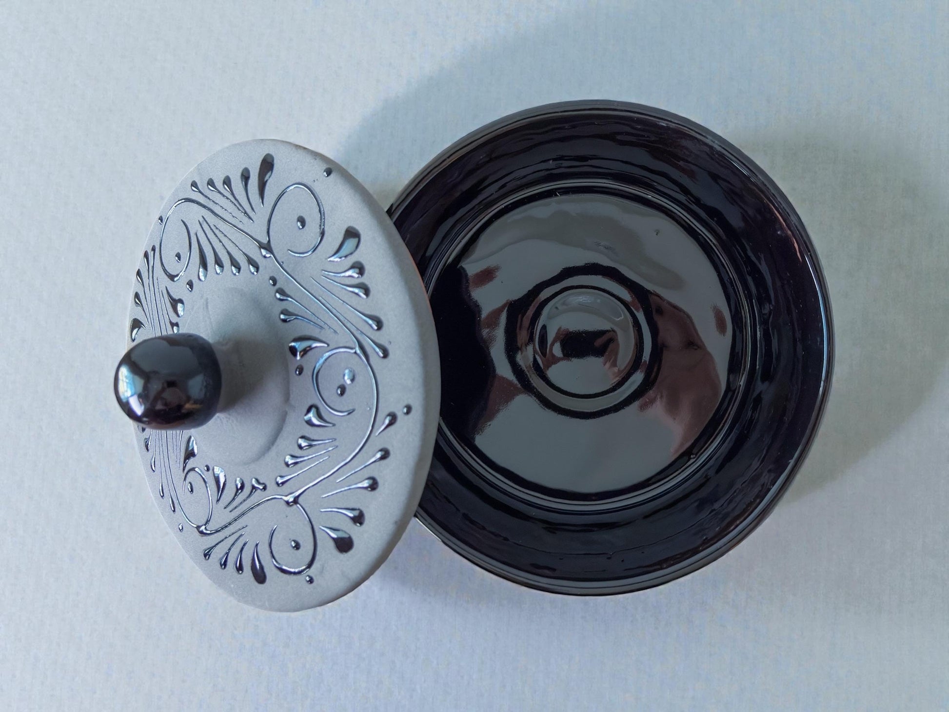 Black ceramic tortilla warmer side view