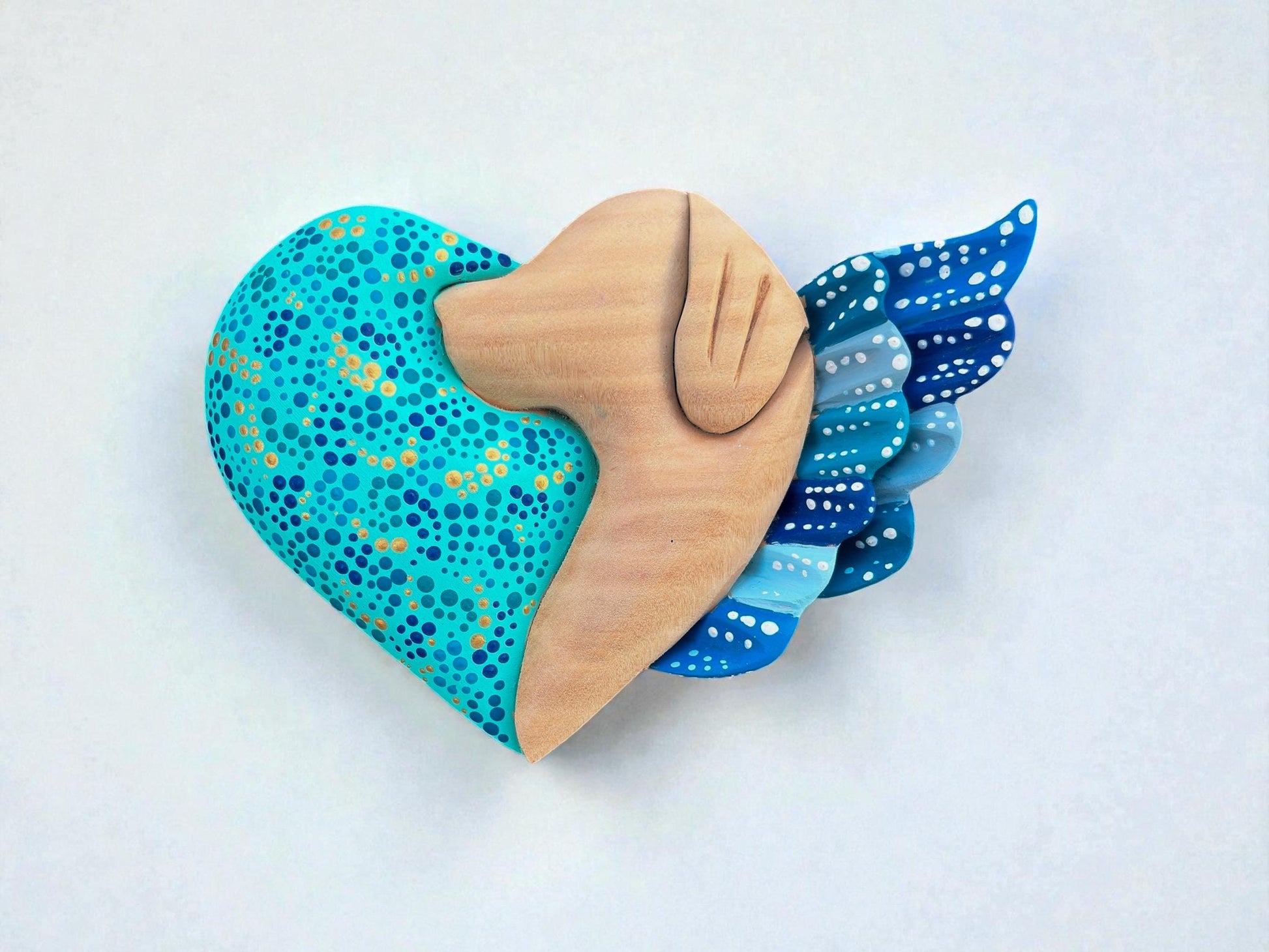 Blue wood dog heart wall art side view, handcarved Mexican folk art