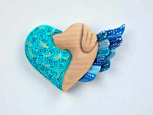 Blue wood dog heart wall art side view, handcarved Mexican folk art
