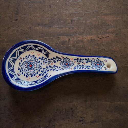 Handmade blue ceramic spoon rest for kitchen countertop