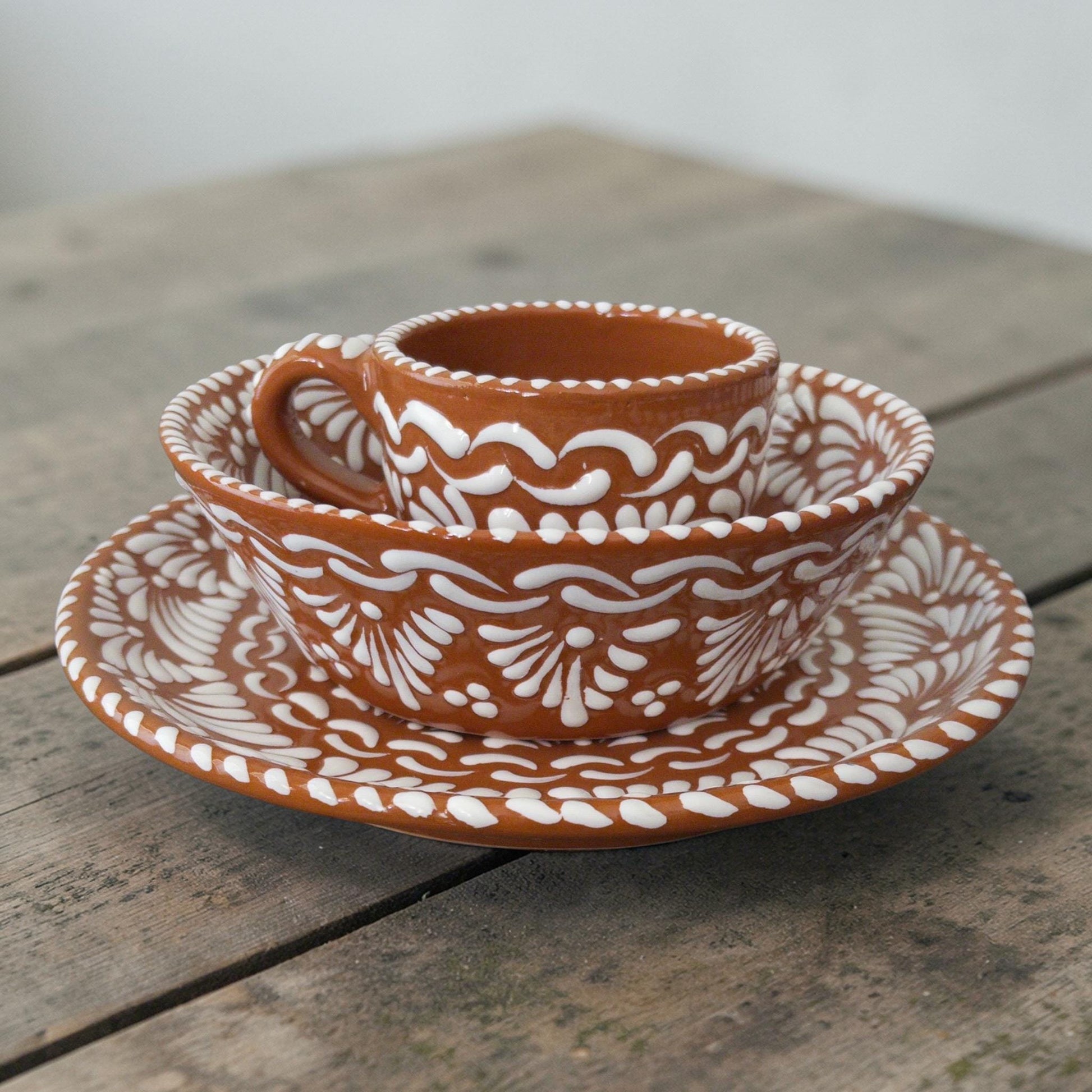 Brown Talavera dinnerware set with plate, bowl and mug