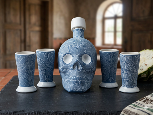 Cobalt blue skull decanter set with four carved shot glasses, handmade Mexican Day of the Dead tequila barware