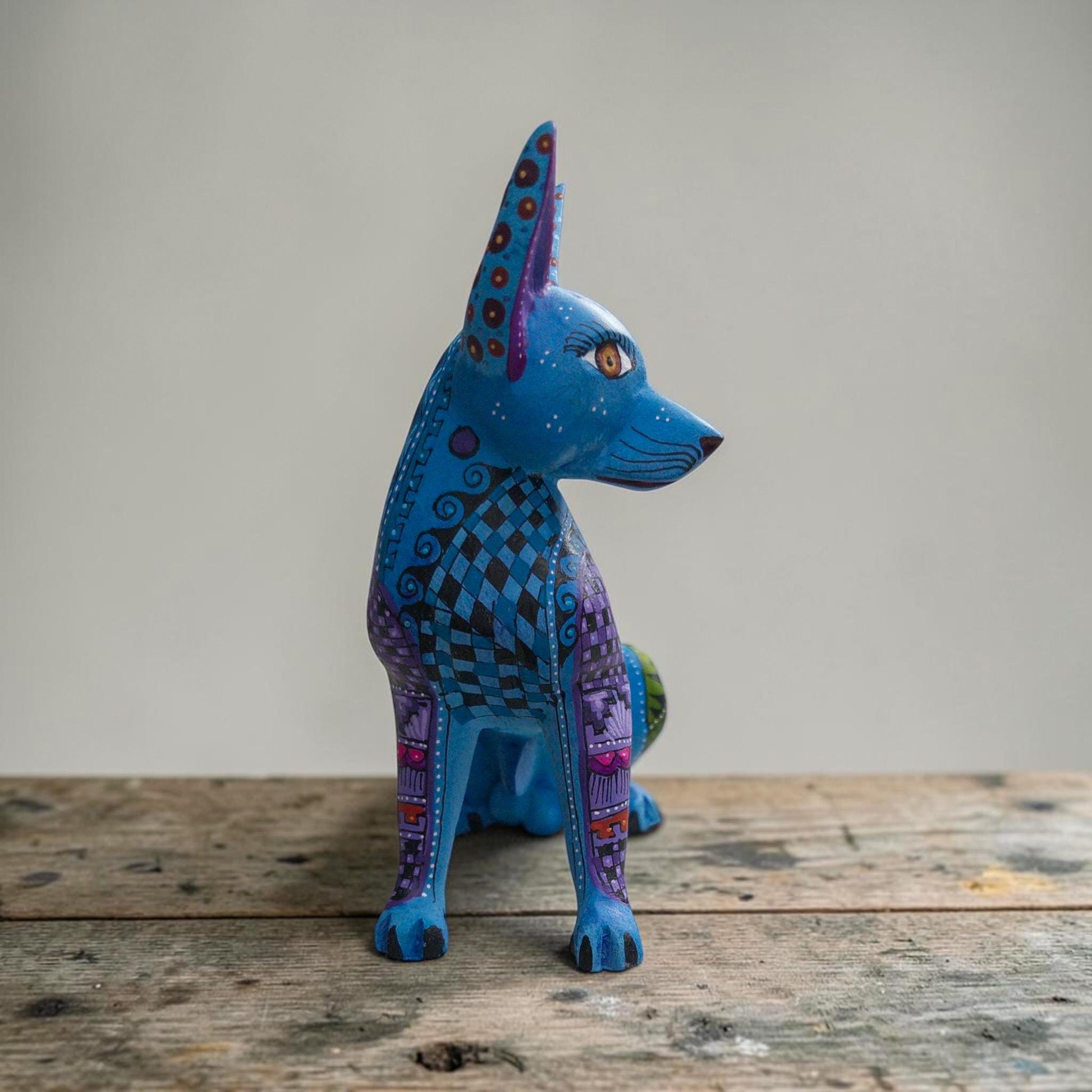 Colorful dog alebrije sculpture by an Oaxacan artisan