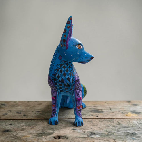 Colorful dog alebrije sculpture by an Oaxacan artisan