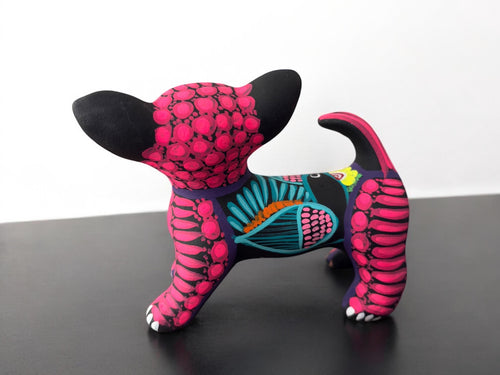 Dog alebrije detail showing traditional alebrije patterns, Mexican artisan clay work