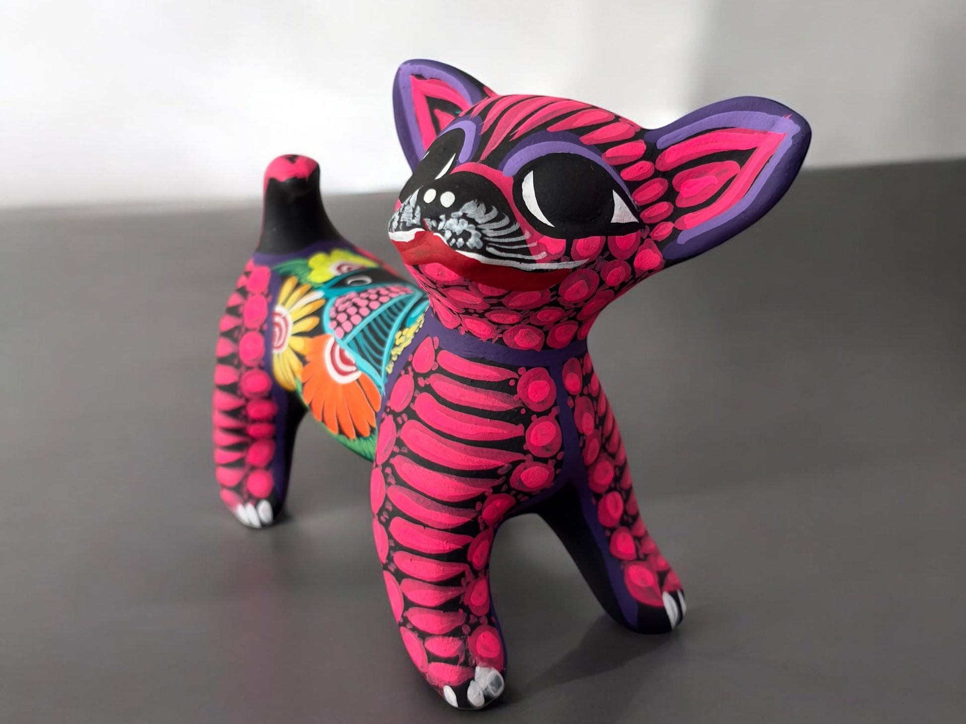 Dog alebrije figurine as home decor, hand-painted Mexican clay sculpture