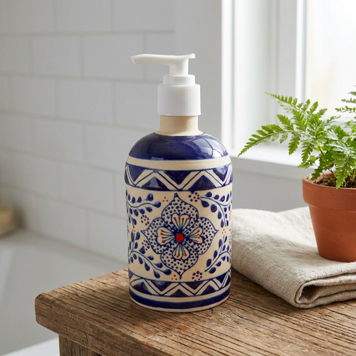 Handmade Blue stoneware ceramic soap dispenser with floral design made in Mexico