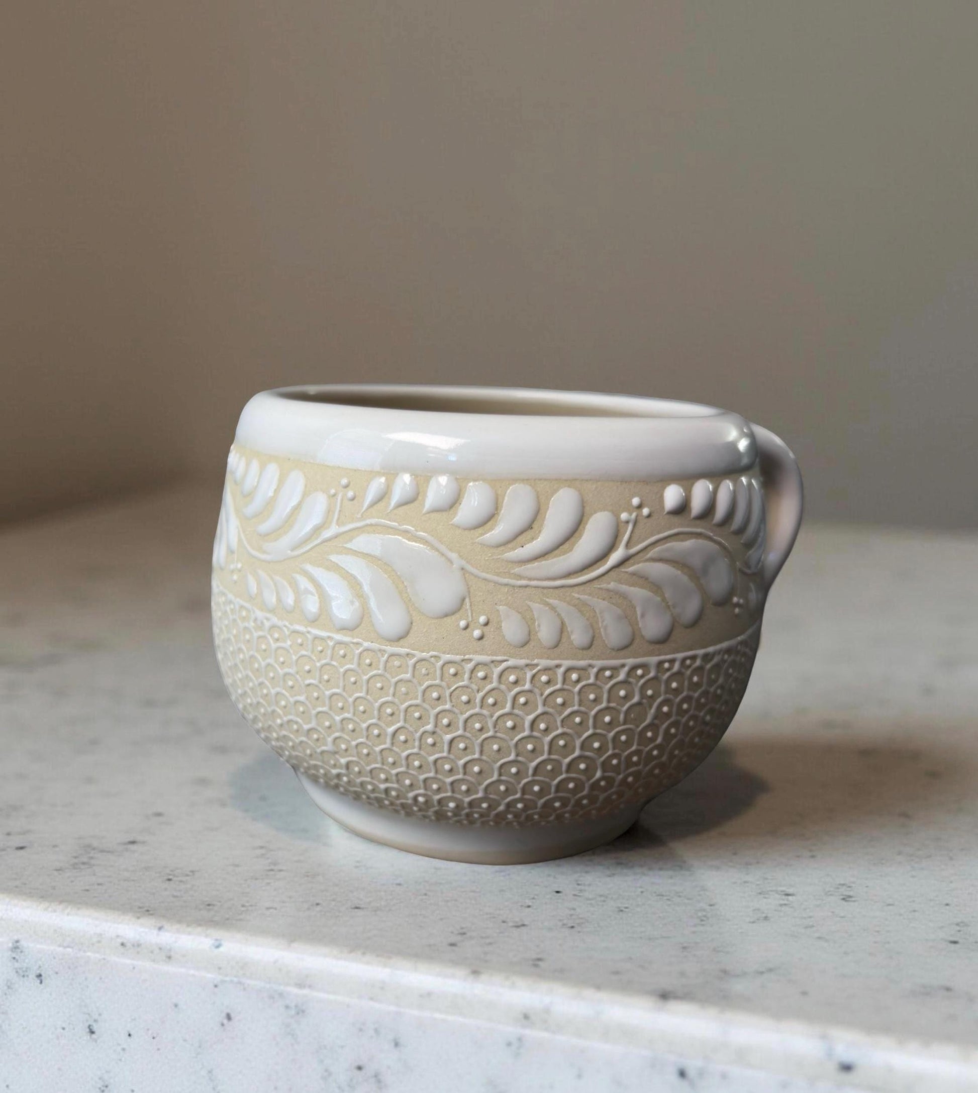 Floral stoneware coffee mug top view, hand-painted Mexican ceramic