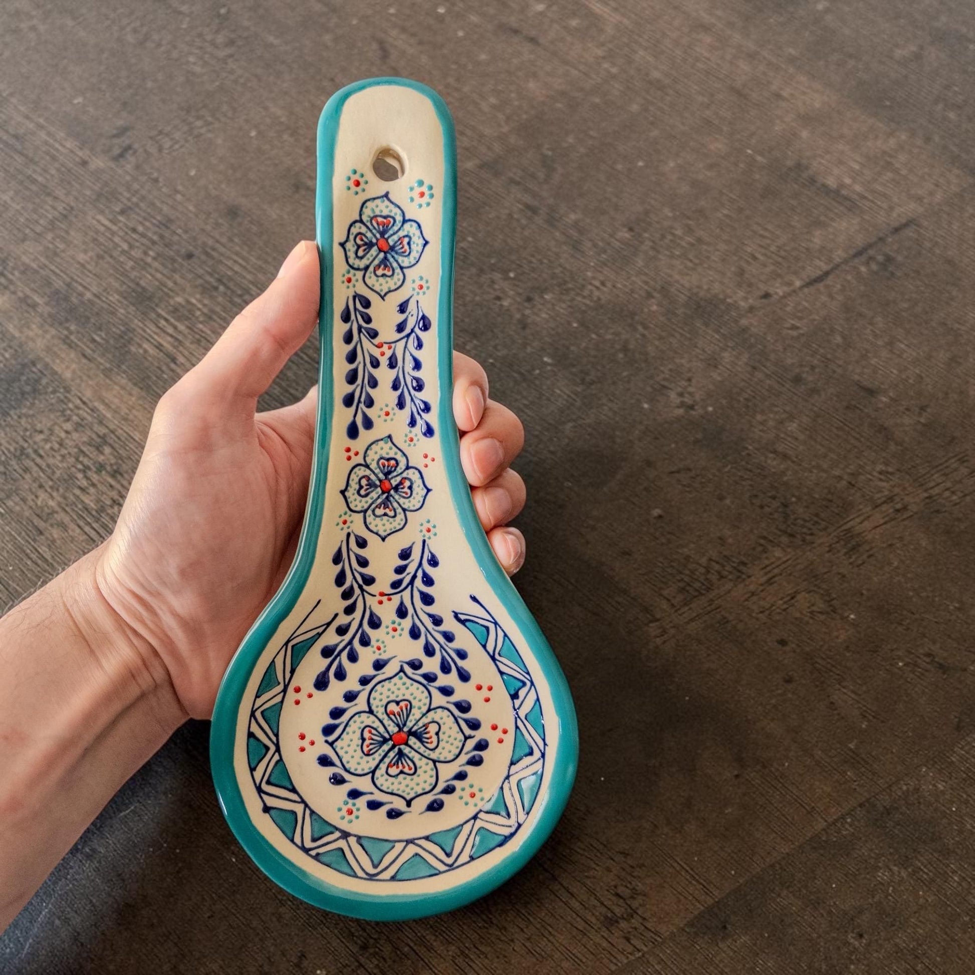 Handmade light blue ceramic spoon rest for kitchen countertop