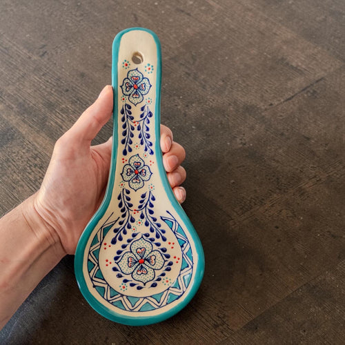 Handmade light blue ceramic spoon rest for kitchen countertop
