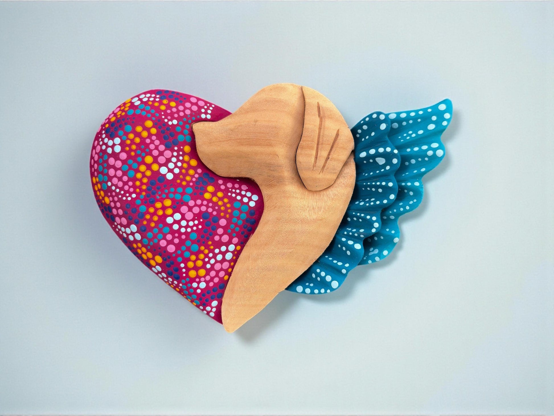 Magenta wood dog heart wall art side view, handcarved Mexican folk art