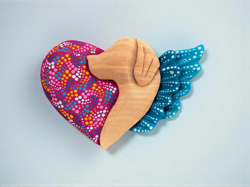 Magenta wood dog heart wall art side view, handcarved Mexican folk art