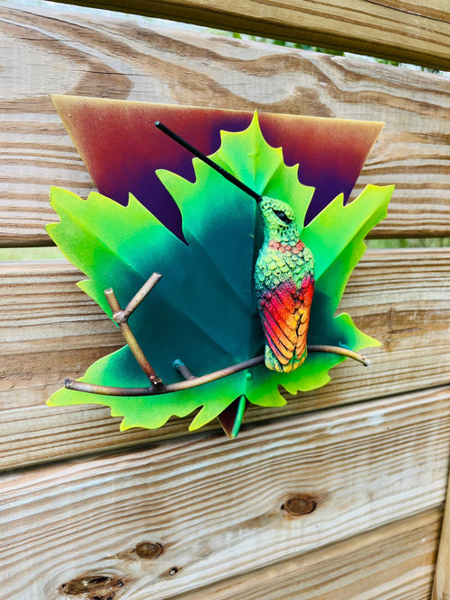 Green metal hummingbird wall art display, handmade Mexican folk art