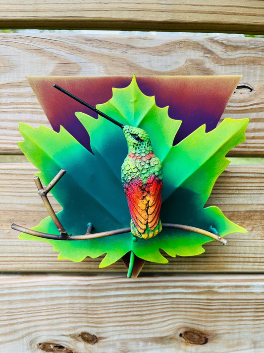 Green metal hummingbird wall art front view, handmade Mexican wall decor