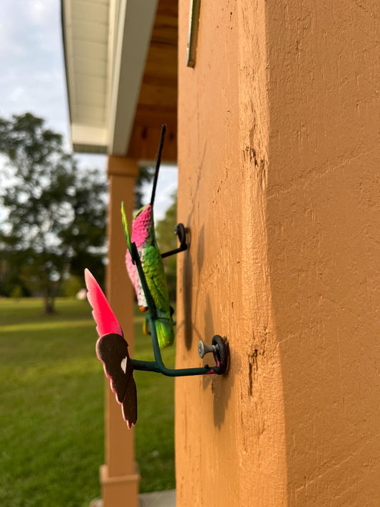 Green and pink metal hummingbird wall decor side view, handmade Mexican wall art