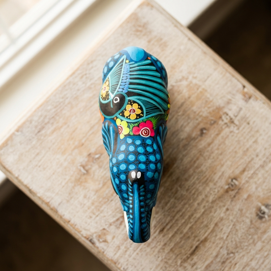 Mexican folk art elephant alebrije displayed as colorful handmade home decor