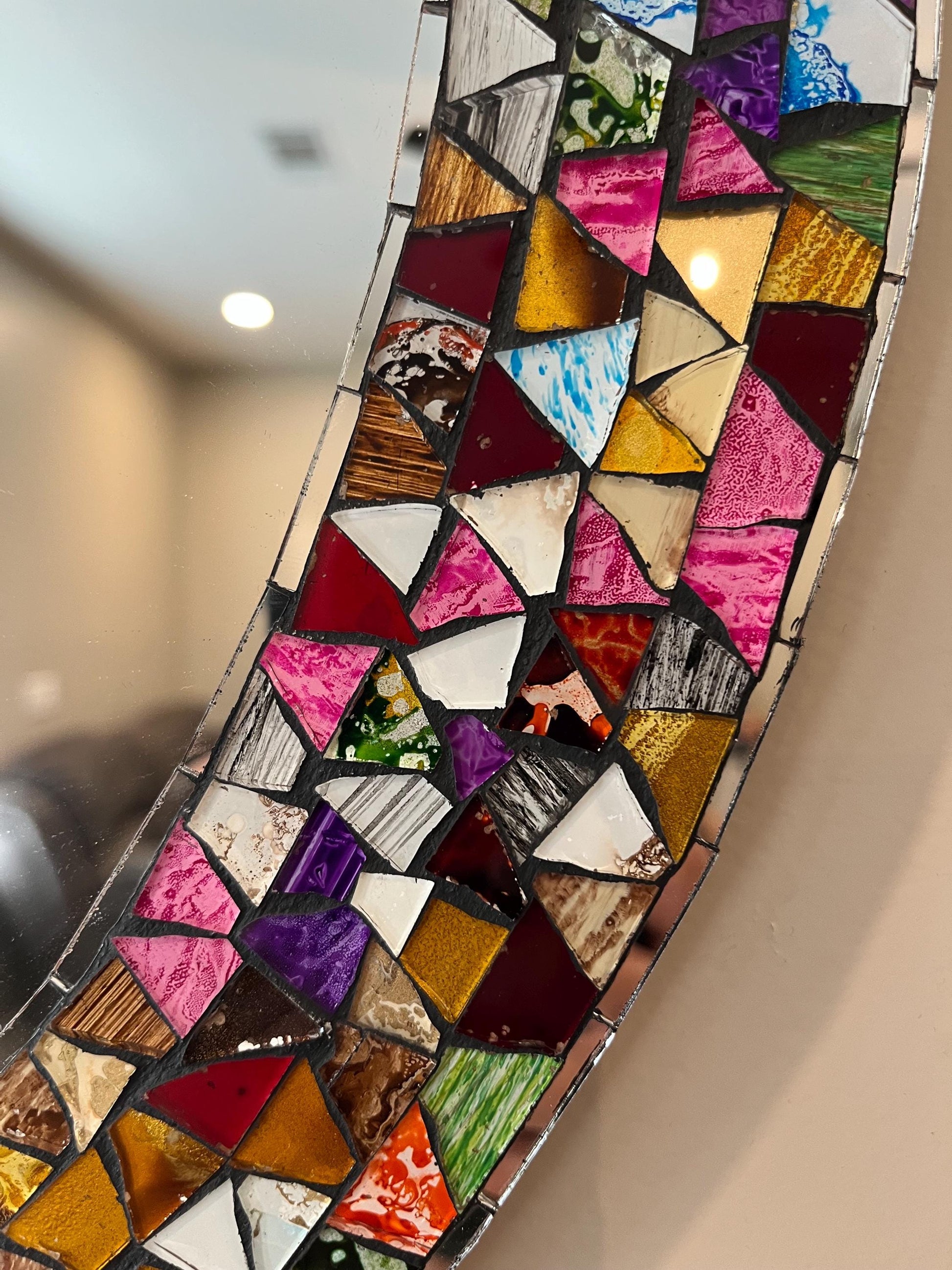Mosaic mirror tile detail close-up, handmade Mexican wall art