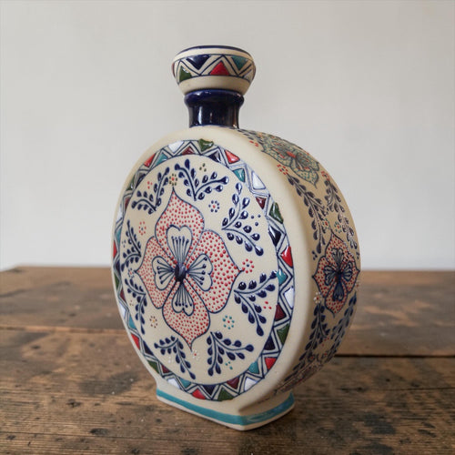 Multicolor stoneware decanter set glaze detail