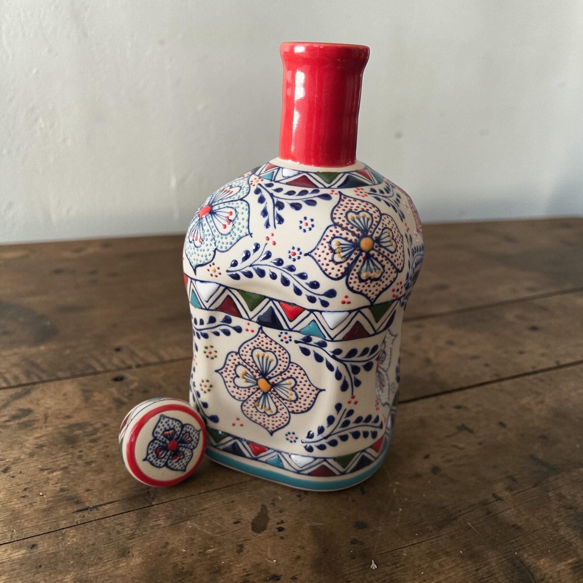 Multicolor stoneware decanter set 35 oz glaze detail