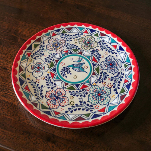 Multicolor stoneware serving plate hand-painted detail