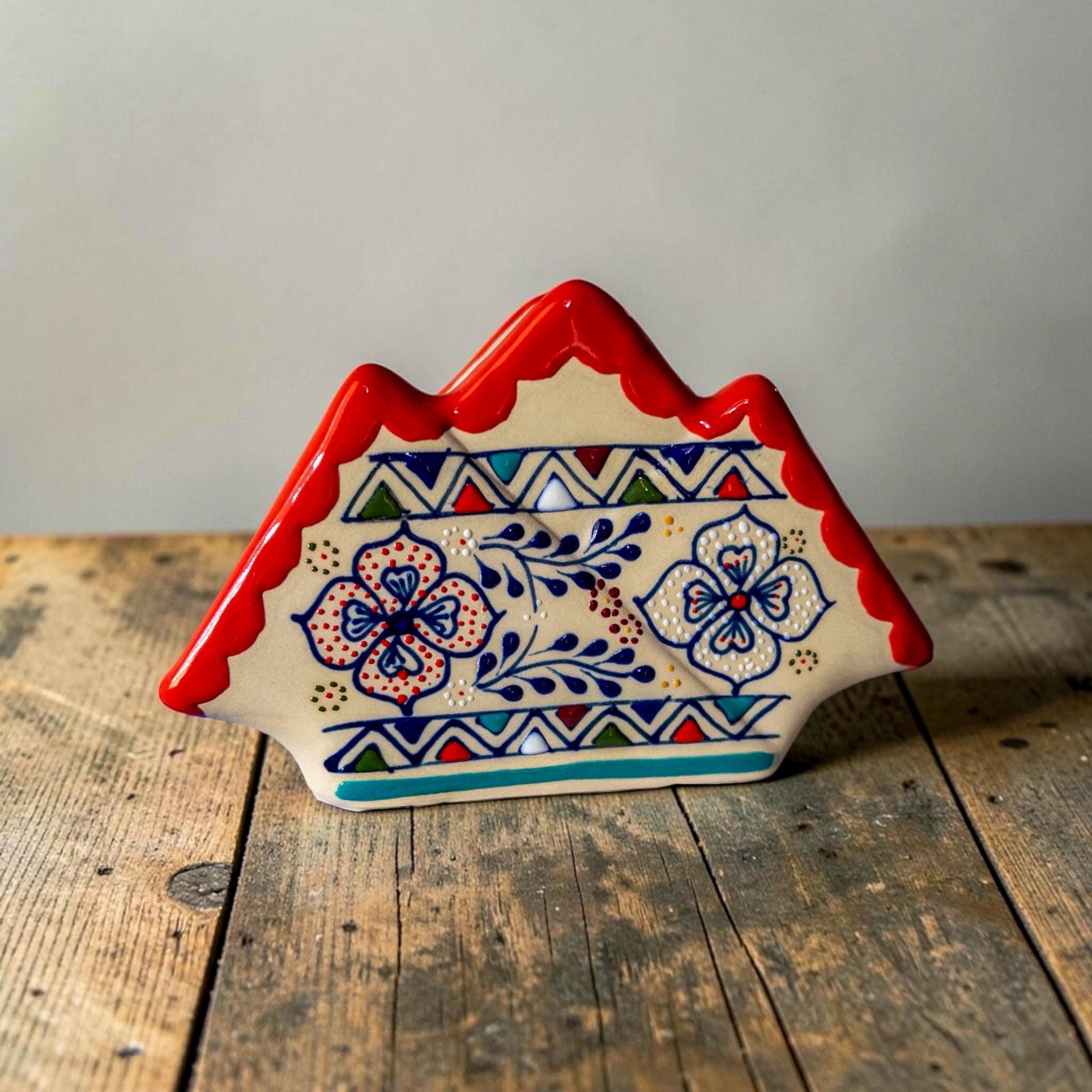 Multicolor ceramic napkin holder side view