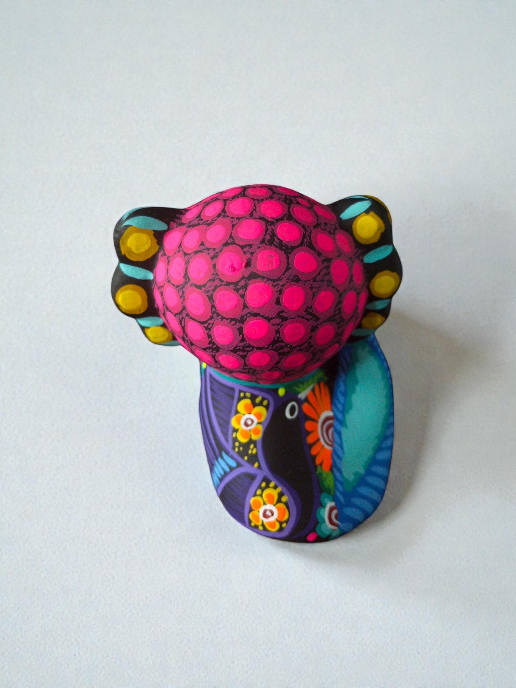 Pink axolotl alebrije detail, handpainted clay Mexican folk art