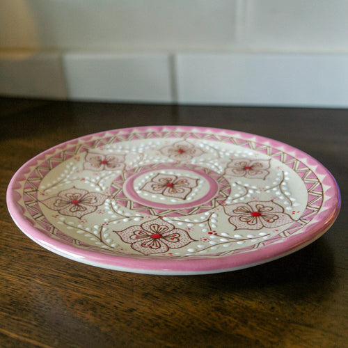 Pink stoneware dinner plate top view handmade