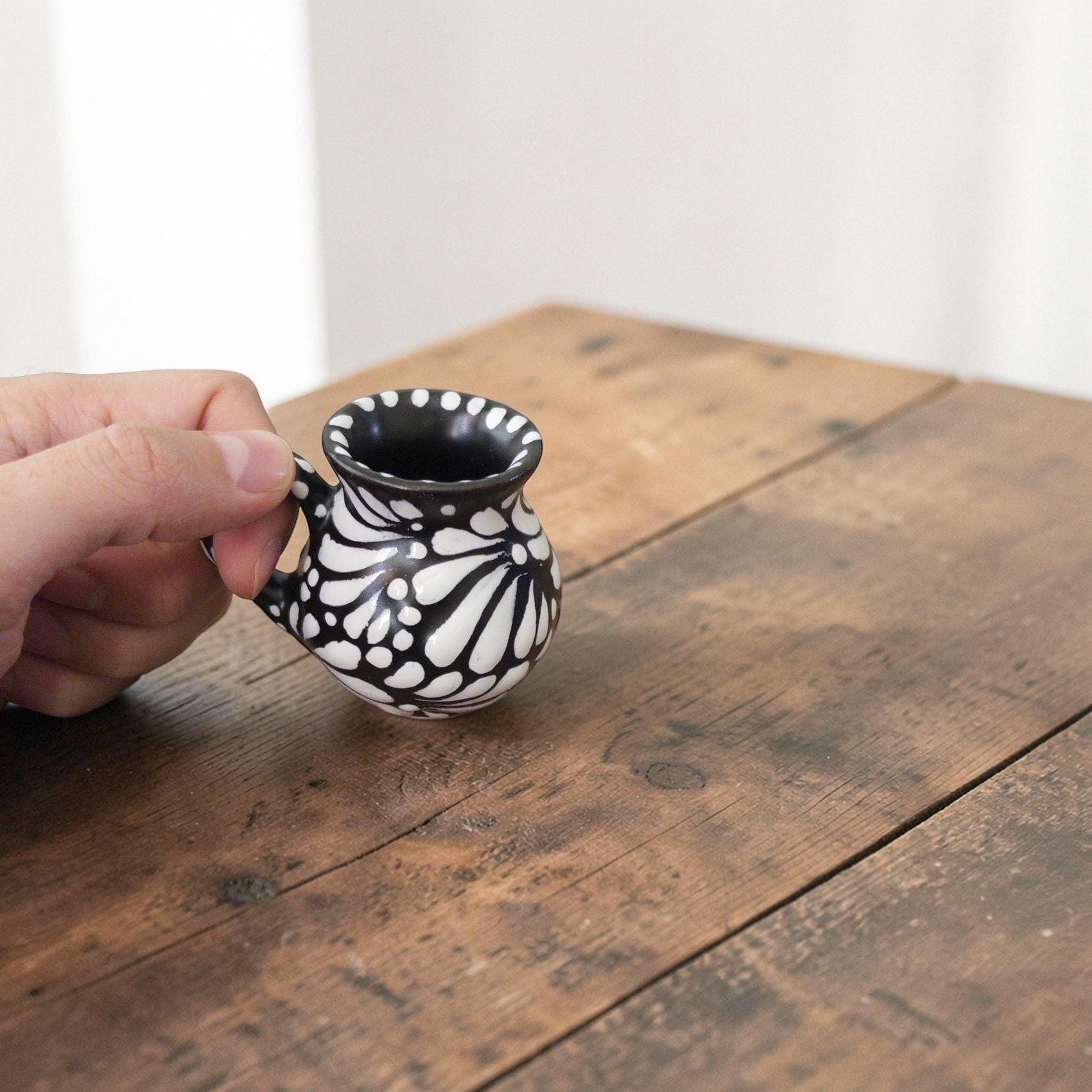 Black Talavera jarrito shot glass handmade in Mexico
