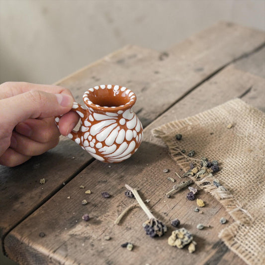Brown Talavera jarrito shot glass detail