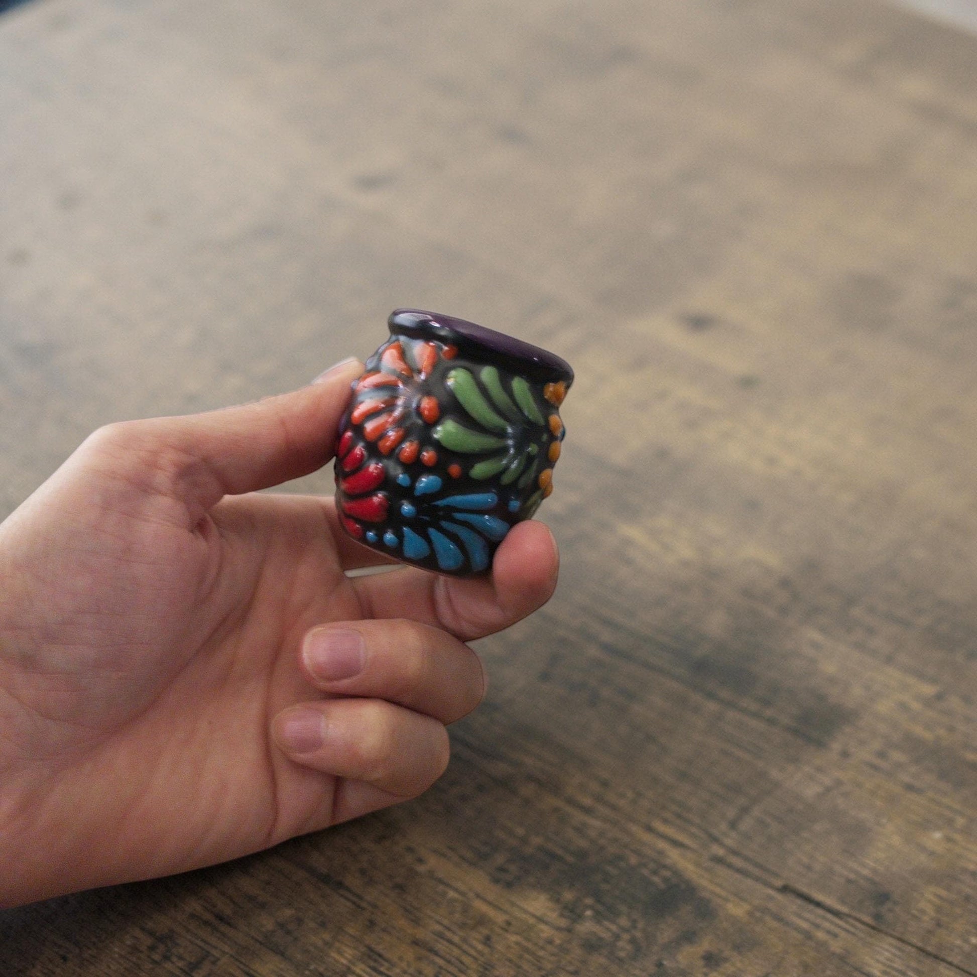 Talavera cantarito shot glass detail, intricate hand-painted pattern