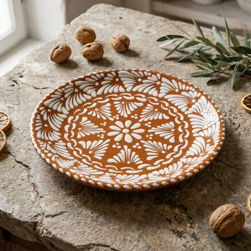 a Handmade Brown and White Talavera Serving Plate with a floral design