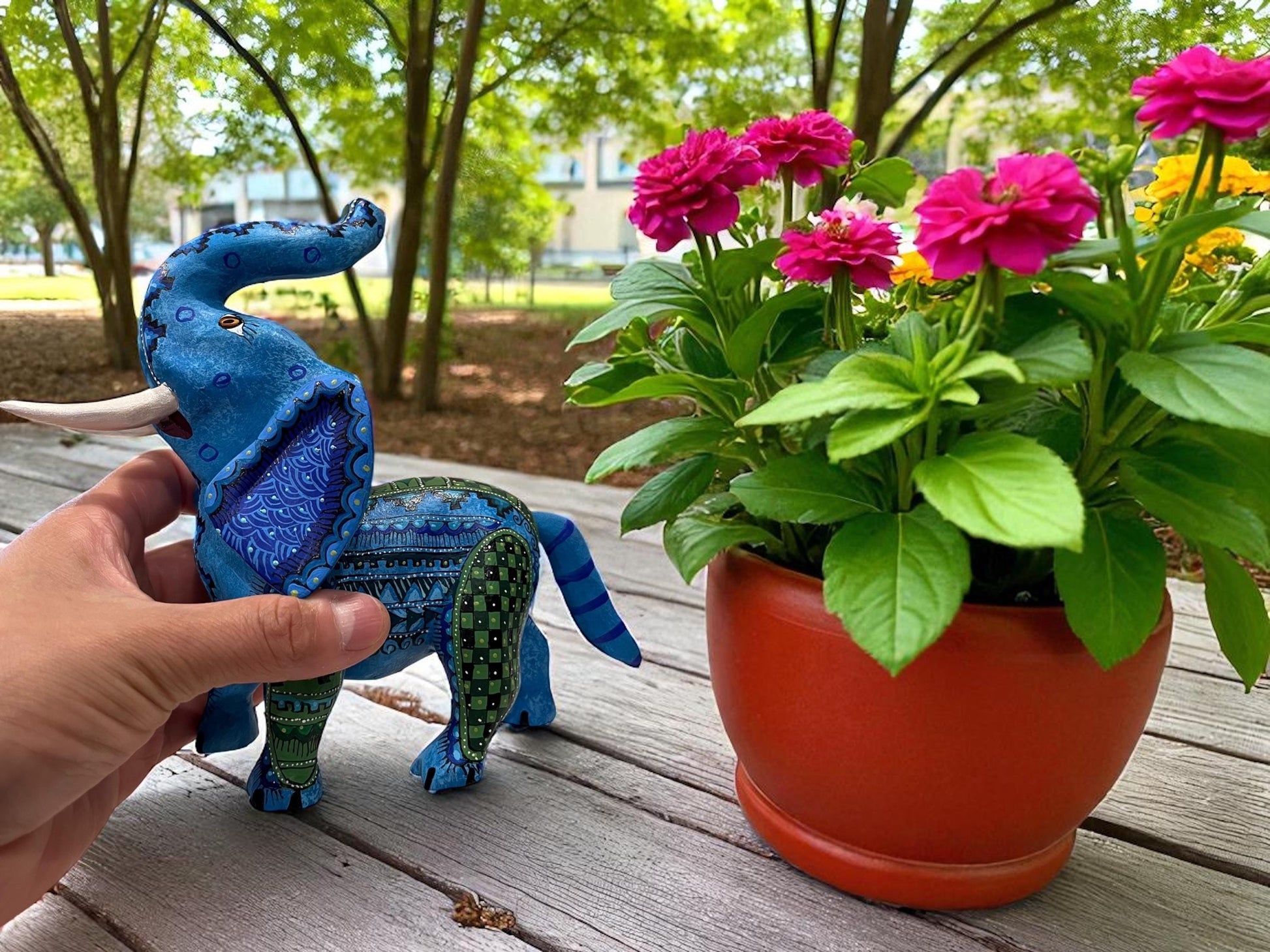 Wood elephant alebrije held in hand, Oaxaca Mexican folk art